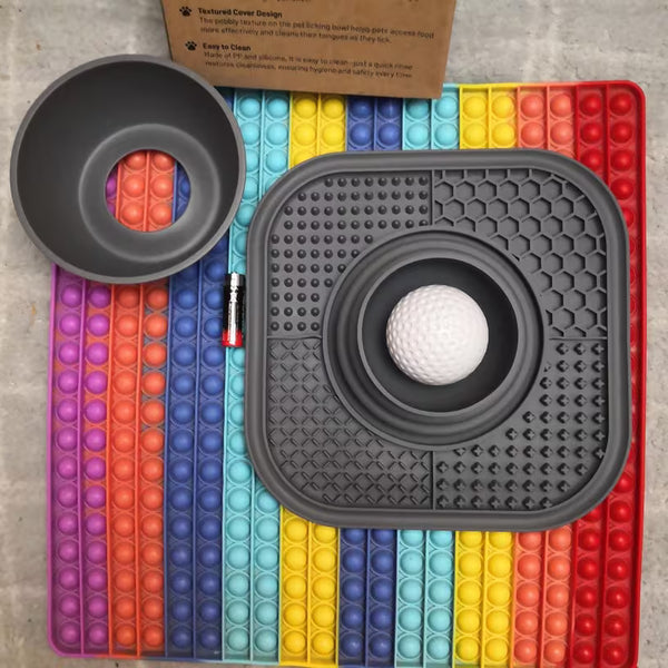 Dog using the Mindful Mutt slow feeder lick mat with frozen paste